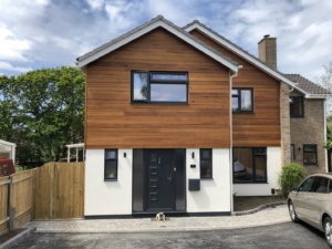 Canadian Red Western Cedar Cladding and Wetherby Render in Fareham